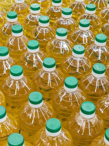 Bottles of canola oil ready for distribution